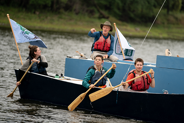 Professor <strong>Joe Underhill</strong> [back] and students paddled hand-crafted catamarans during the 2021 River Semester. (Photo by Courtney Perry)